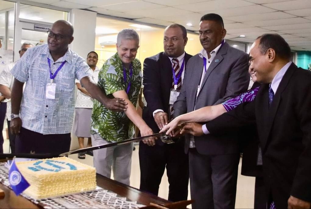 High Commissioner Soaki (3rd from left) with the Fiji Police Acting Deputy Commissioner, Itendra Nair (centre), Deputy Secretary of Foreign Affairs, Esala Nayasi (1st left) and members of the resident Diplomatic Missions jointly cut the cake to signify the launching of the PICP Strategic Plan. (Phote: Fiji Polic Force) 