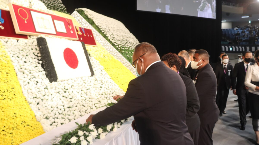 DPM Maelanga lays his commemorative wreath during the state funeral on Tuesday