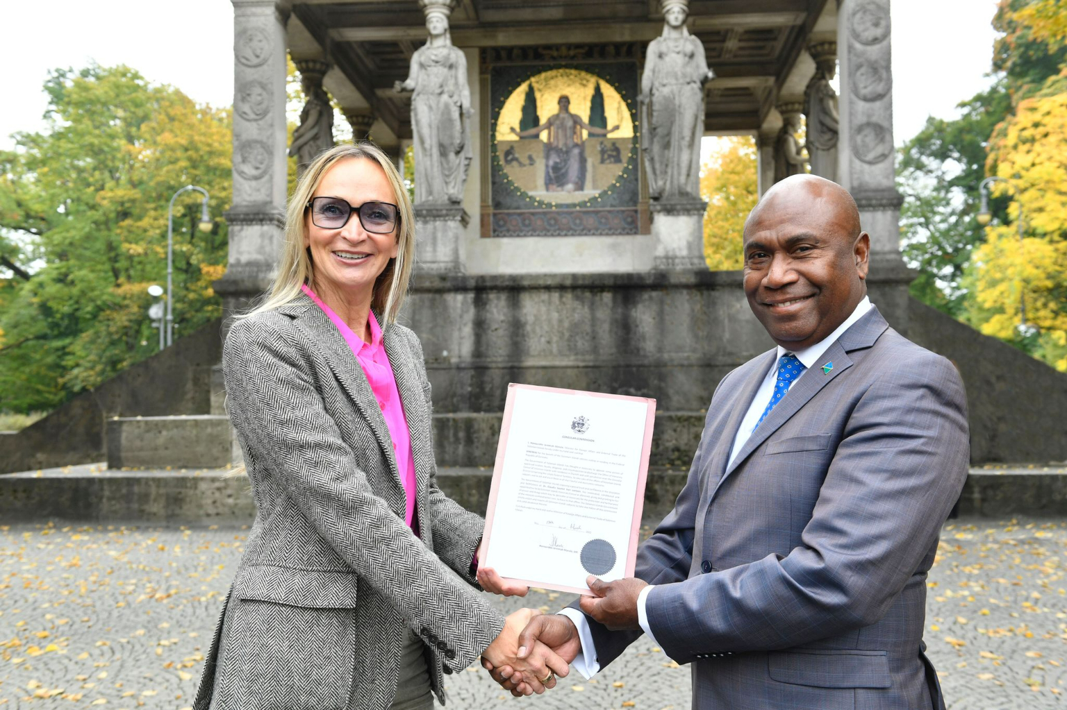 Ambassador H.E Moses Mose officiating the appointment of Dr. Claudia Seutter von Lötzen as the Honorary consul of Solomon Islands to Germany