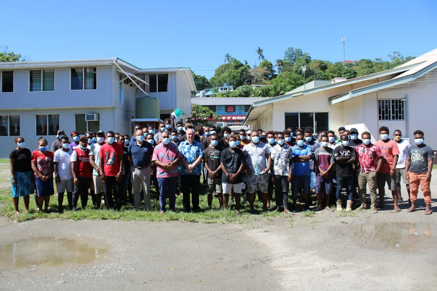 The 94 workers who will be leaving the Solomon Islands to work in Australia. Here they share a moment with officials from the Ministry of Foreign Affairs and External Trade and the Australian High Commission in Honiara.