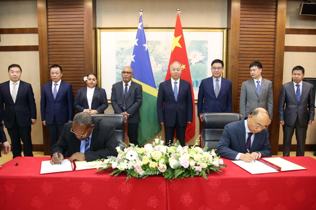 MOU signing between Minister Giro and Chairman of CNFC  Mr. Zong Wenfeng