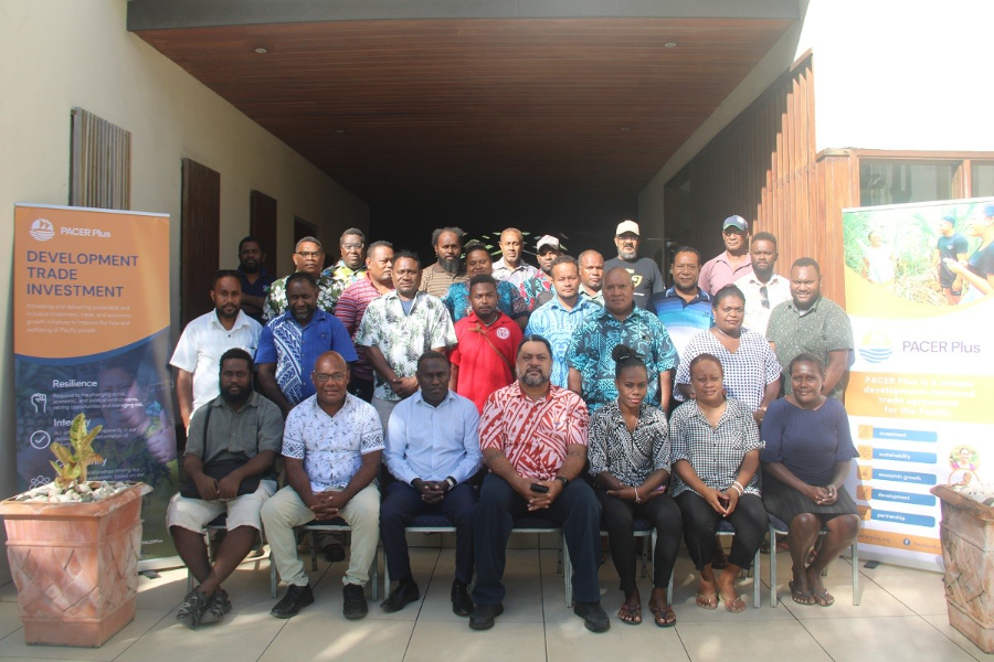 Trade Commissioner in the Ministry of Foreign Affairs and External Trade, Barret Salato with facilitator of the SPS and TBT workshop and PPIU Trade and Investment Advisor, Mr. Alipate Tavo at a group photo with members of the private sector.
