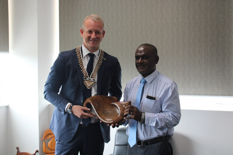 New Australian High Commissioner to the Solomon Islands, His Excellency Rod Hilton receiving a gift from the Minister of Foreign Affairs and External Trade, Hon. Jeremiah Manele today