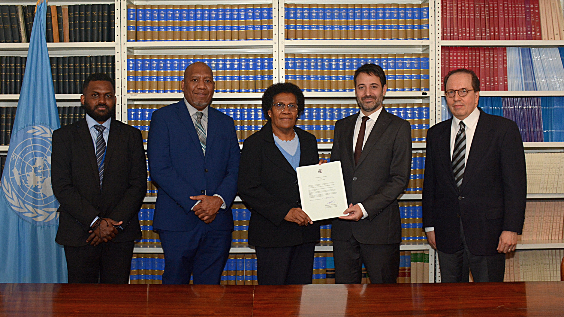  H.E Mrs. Jane Waetara formally deposits the Comprehensive Nuclear Test Ban Treaty in a ceremony at the UN Headquarters to mark the ratification. Mr. David Nanopoulos, Chief of the UN Treaty Section officiated the ceremony witnessed by officials from the Solomon Islands Mission to the United Nation in New York and an official from the CTBTO