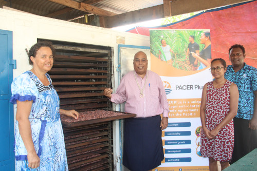  Permanent Secretary of the Ministry of Foreign Affairs and External Trade, Mr. Collin Beck with Ms. Diana Yates, founder of Cathliro Commodities after the handing over ceremony today. With them is the Director of Trade, Ms Natalia Patternot and Pacer Plus National Coordinator- Solomon Islands, Tristein Zutu.