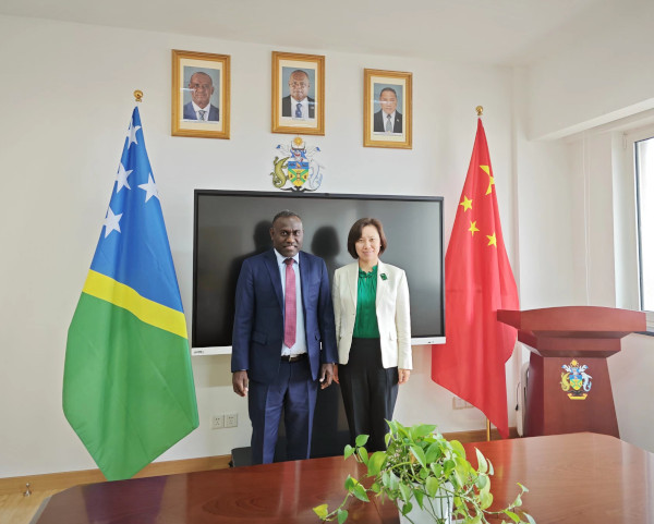 H.E Barrett Salato and Ms. Wei Xiaowei of the National Energy