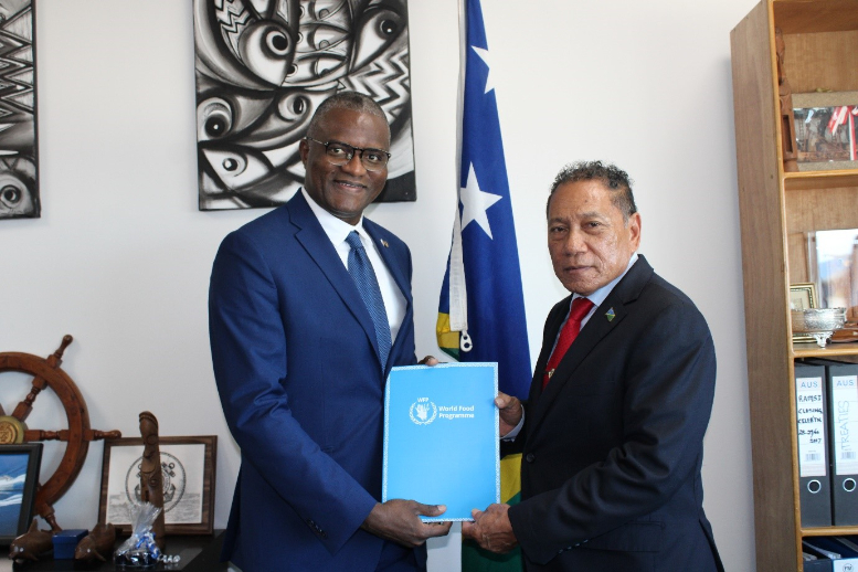 The Minister of Foreign Affairs and External Trade, Hon. Peter Shanel Agovaka receiving the letter of credentials from the Representative and Country Director of the United Nations World Food Programme (WFP), Mr. Alpha Bah yesterday (Thursday 4th December 2024).