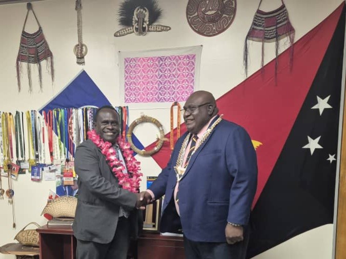 MCA Minister, Hon. Kologeto with Hon. Timothy Masiu, PNG Minister for ICT after their meeting.    
